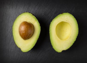 A ripe avocado for mental health stress relief and good mood